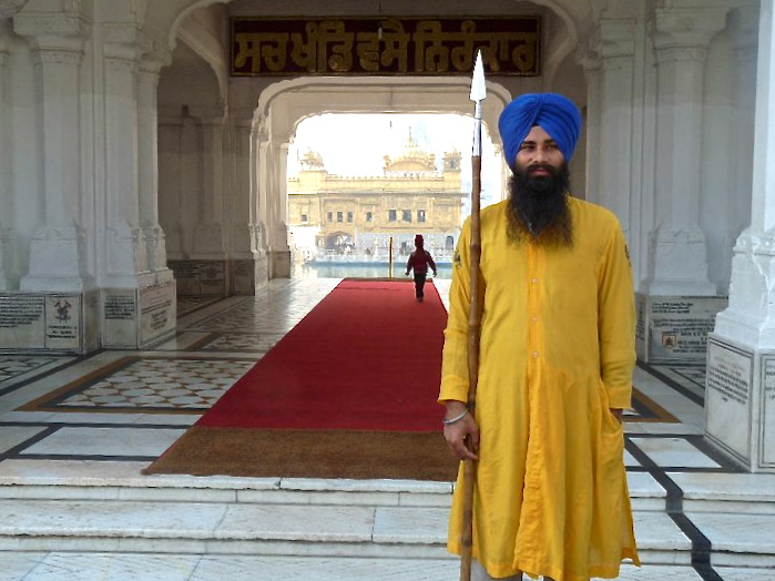 Golden temple with Sikh guard